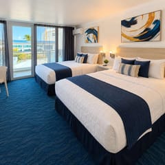 Queen Beds at ESJ Towers on Isla Verde Beach