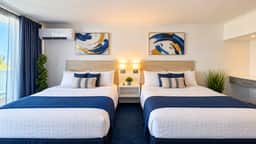 Queen Beds at ESJ Towers on Isla Verde Beach - Image 3