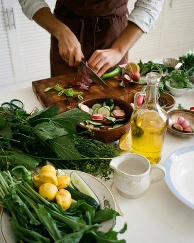 Fresh herbs and vegetables on a chopping board