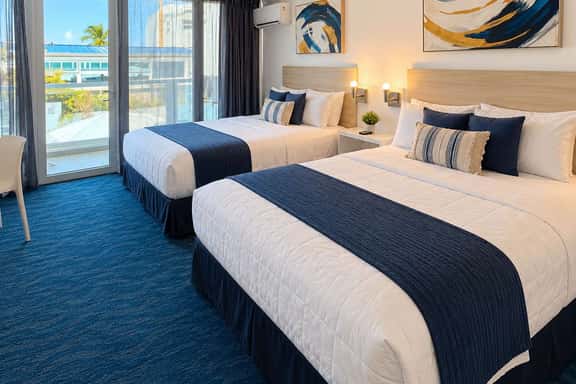 Queen Beds at ESJ Towers on Isla Verde Beach - Image 1