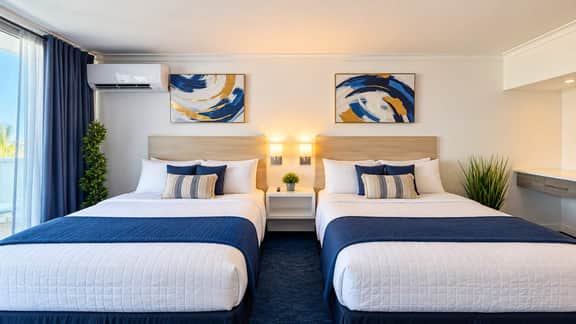 Queen Beds at ESJ Towers on Isla Verde Beach - Image 3